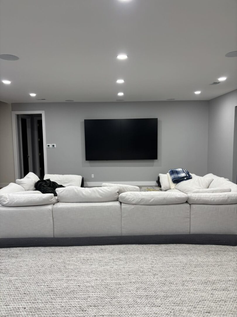Modern living room with large sectional sofa.